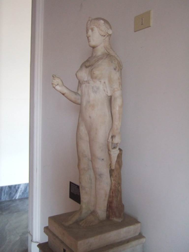 VIII.7.28 Pompeii. Marble statue of Isis found in the north east corner of the portico. Now in Naples Archaeological Museum. Inventory number 9976.