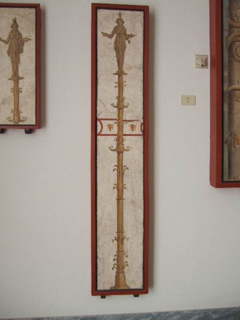 VIII.7.28 Pompeii. Priestess on a candelabrum carrying a crocodile.
Found in passageway of arch. Now in Naples Archaeological Museum.