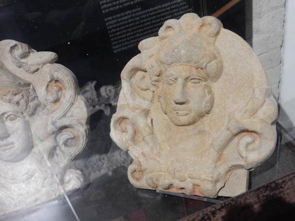 VIII.7.31 Pompeii, May 2018. Architectural antefix of a head. Female heads and heads of Minerva and Hercules alternated in the temple decoration.
Photo courtesy of Buzz Ferebee.