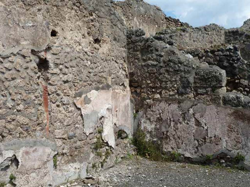 IX.1.1 Pompeii. May 2010. North-east corner of shop.