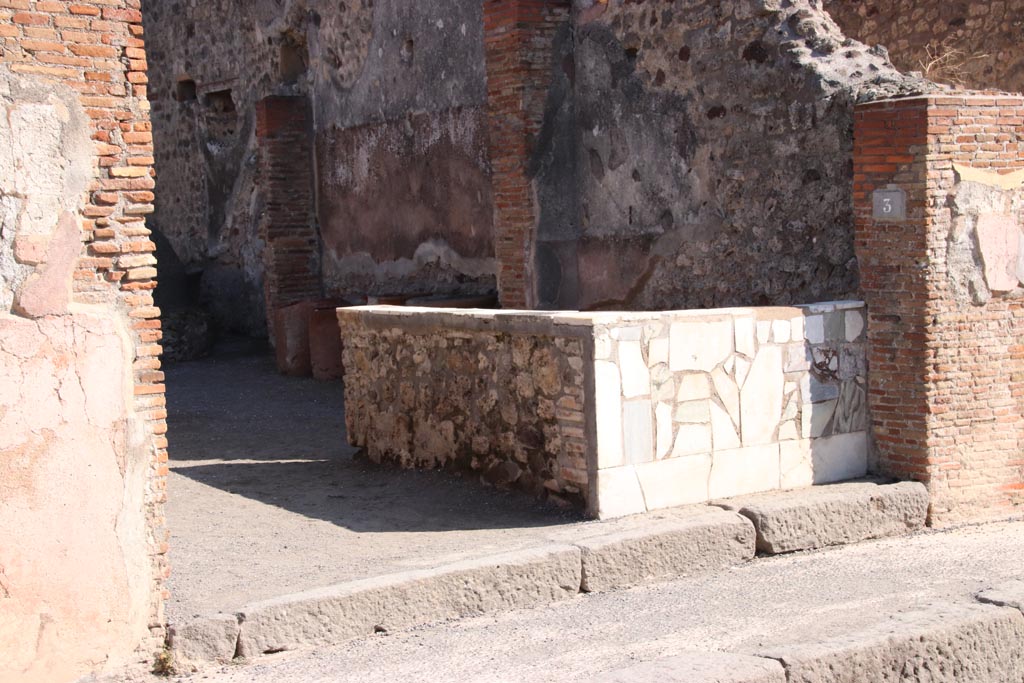 IX.1.3 Pompeii. October 2022. Looking towards entrance doorway on east side of Via Stabiana. Photo courtesy of Klaus Heese.