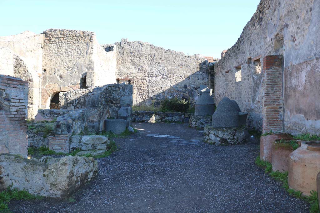 IX.1.3 Pompeii. December 2018. Looking east across bakery. Photo courtesy of Aude Durand.
