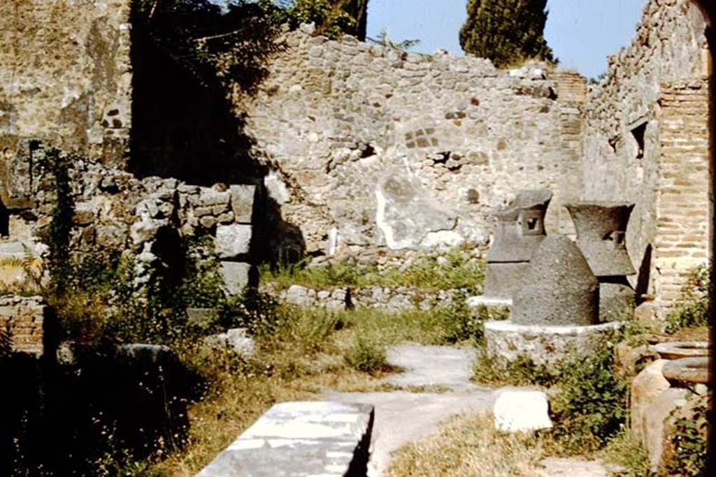 IX.1.3 Pompeii. 1959. Looking east across bakery. Photo by Stanley A. Jashemski.
Source: The Wilhelmina and Stanley A. Jashemski archive in the University of Maryland Library, Special Collections (See collection page) and made available under the Creative Commons Attribution-Non Commercial License v.4. See Licence and use details.
J59f0227