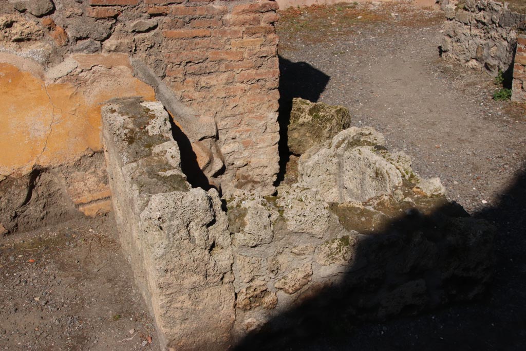 IX.1.3 Pompeii. October 2022.
Looking towards north wall of bakery shop, with doorway to cubiculum, on right. Photo courtesy of Klaus Heese
