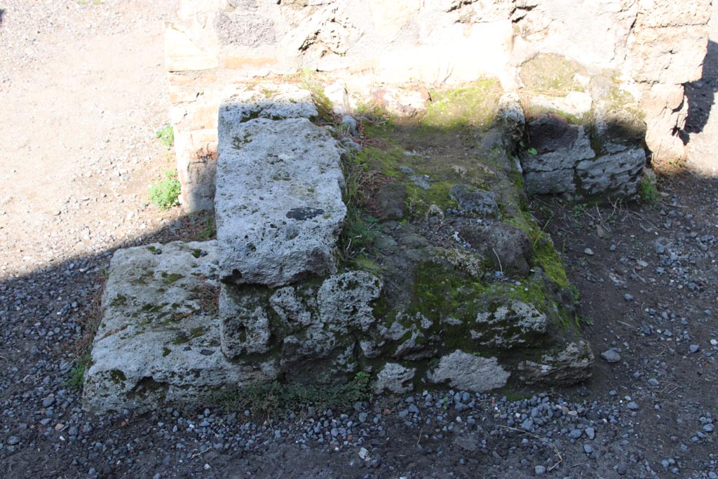 IX.1.3 Pompeii. October 2022.
Looking north towards lower stone steps of stairs to upper floor, on east side of doorway to cubiculum, on left. Photo courtesy of Klaus Heese