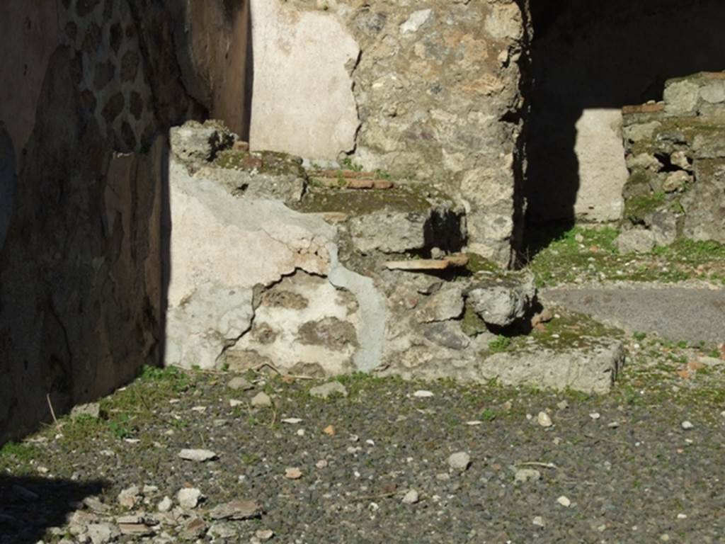 IX.1.4 Pompeii. March 2009. Staircase in north east corner of shop.