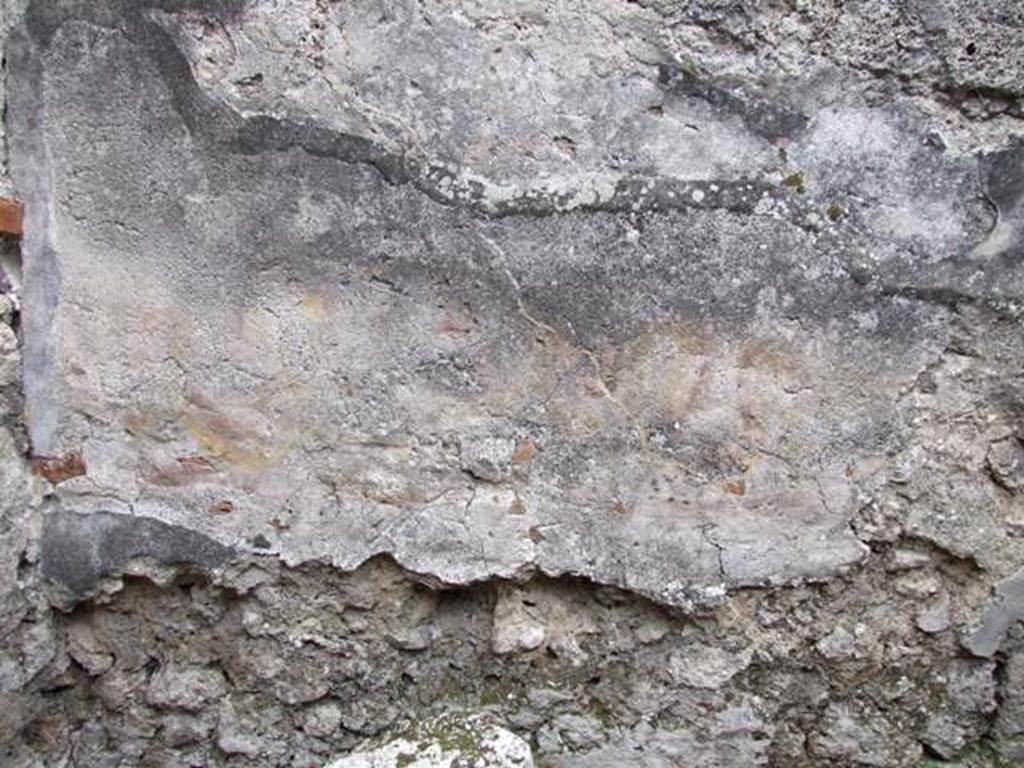 IX.1.12 Pompeii. December 2007. Room in north west corner next to corridor. Kitchen. Is this the remains of the two painted snakes recorded by Helbig? See Helbig, W., 1868. Wandgemälde der vom Vesuv verschütteten Städte Campaniens. Leipzig: Breitkopf und Härtel. (66).
