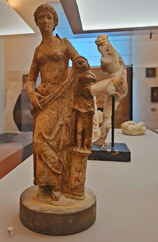 IX.1.20 Pompeii. October 2023.
Marble statue of half-naked Venus leaning against an idol. Photo courtesy of Giuseppe Ciaramella.
On display in “L’altra MANN” exhibition, October 2023, at Naples Archaeological Museum, inv. 109620.
According to D’Acunto -
This was found in the lararium on the 19/02/1866.
See Marmora Pompeiana nel Museo Archeologico Nazionale di Napoli: Studi della SAP 26, (p. 163, D05).
See Dwyer, E. J., 1982. Pompeian Domestic Sculpture: a Study of Five Pompeian Houses and their Contents. Roma: Bretschneider, tav.1, fig.202.