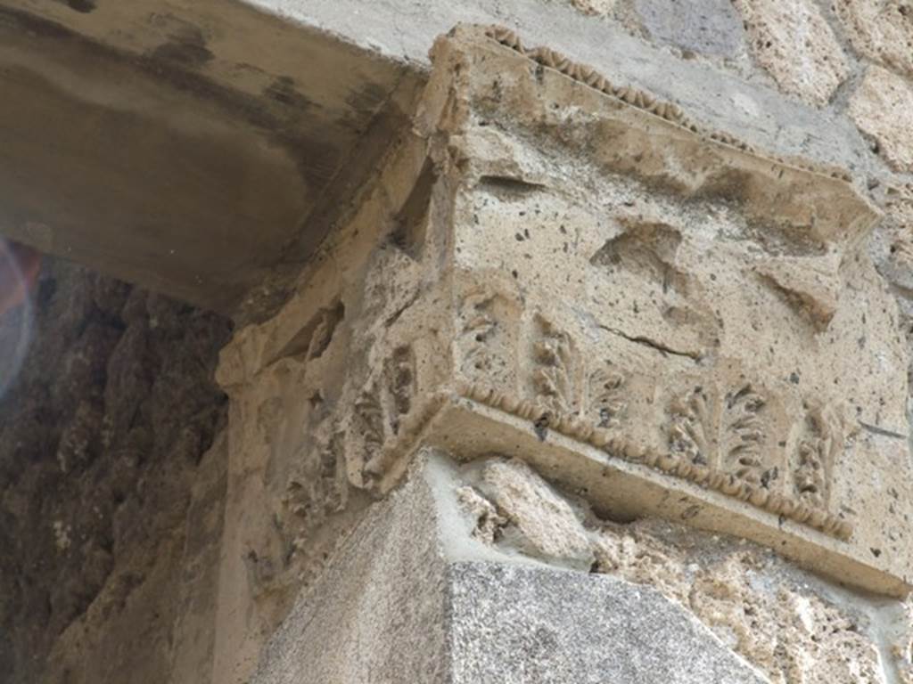 IX.1.20 Pompeii. December 2007. Room 2. Atrium. East Side. Figured capital from south eastern corner consisting of a bust above a band of acanthus (damaged).