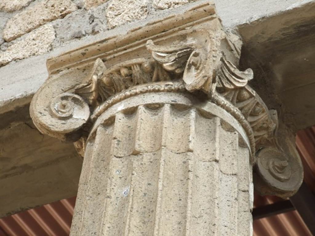 IX.1.20 Pompeii. December 2007. Room 2. Atrium. East Side. Ionic column capital.