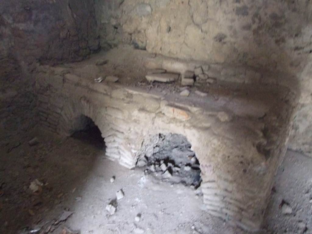 IX.1.20 Pompeii. December 2007. Room 13. Kitchen hearth.