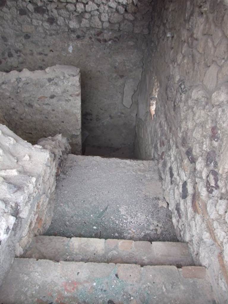 IX.1.20 Pompeii. December 2007. Looking down staircase at the rear of Room 15.