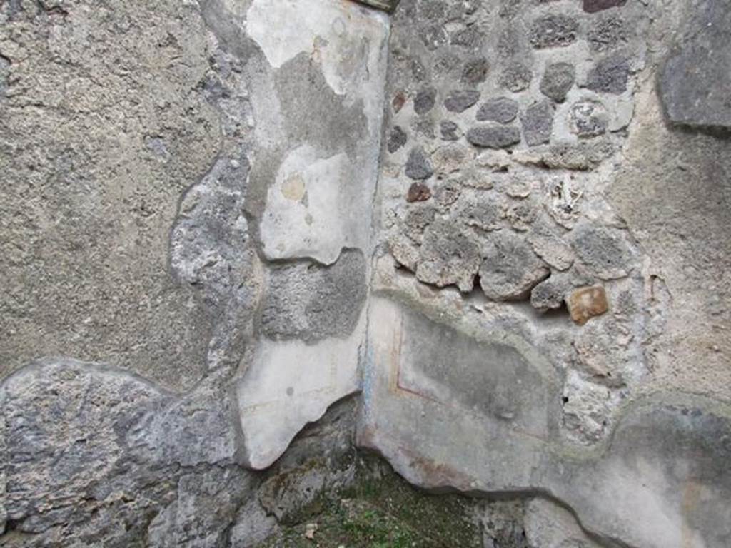 IX.1.22 Pompeii. December 2007. Room 32, south-east corner of cubiculum with window onto Vicolo di Tesmo. According to Bragantini, the east wall would have had a white middle zone divided into panels with borders, and with a stucco cornice. The south wall had a dado that was illegible, and the middle zone with white panels divided into panels with borders separated by divisions with candelabra, and a stucco cornice.
See Bragantini, de Vos, Badoni, 1986. Pitture e Pavimenti di Pompei, Parte 3. Rome: ICCD. (p.396, cubicolo ‘g/’)
