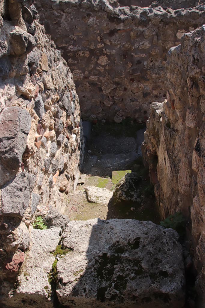 IX.1.34 Pompeii. October 2022.
Stairs to upper floor that would have been above the latrine in IX.1.1. Photo courtesy of Klaus Heese