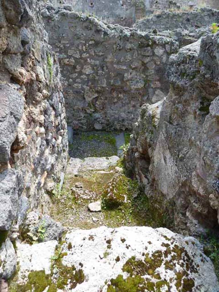 IX.1.34 Pompeii. May 2010. Latrine to the south and under the stairs to upper floor.