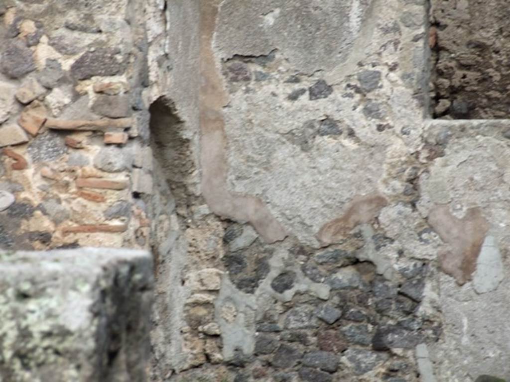 IX.2.4 Pompeii. December 2007. North-east corner of triclinium with arched niche.