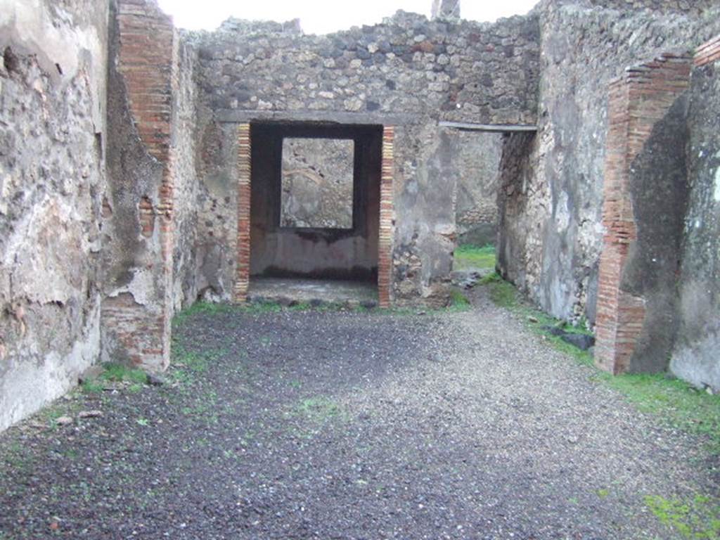 IX.2.5 Pompeii. December 2005. Looking east from shop towards rear.