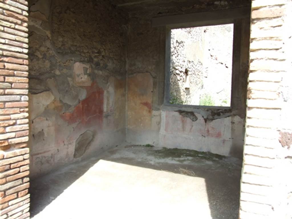 IX.2.5 Pompeii. March 2009. Doorway to triclinium, looking towards north-east corner, and window to garden in east wall. In this room, the zoccolo would have been black, the central panel on the walls was red, the side panels were yellow. According to Sogliano, the paintings found in this room were – Ariadne abandoned (p.97, no.535), A bust of Paris wearing a green heat, with cupid on his right shoulder (p.105, no.558), A bust of Helen, turning to the left, in response to no.558, faded and vanishing (p.108, no.567), Cimone and Perona (p.121, no.599) now in Naples Museum, inv. no: 115398.
See Sogliano, A., 1879. Le pitture murali campane scoverte negli anni 1867-79. Napoli: Giannini.