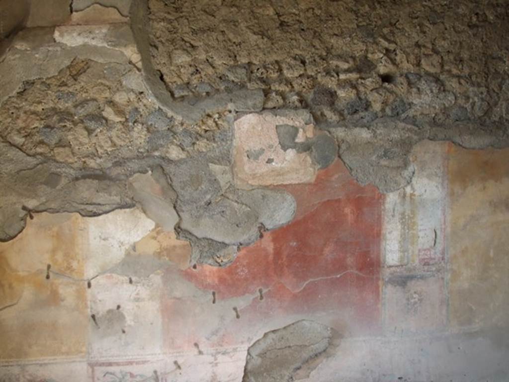 IX.2.5 Pompeii. March 2009. North wall of triclinium. On the north wall was a painting of Ariadne seated on the ground watching the ship of Theseus sailing away. Nemesis is at her shoulders and Cupid is turned towards her, holding his bow and wiping away his tears.
See Sogliano, A., 1879. Le pitture murali campane scoverte negli anni 1867-79. Napoli: (p.97, no.535). See Pappalardo, U., 2001. La Descrizione di Pompei per Giuseppe Fiorelli (1875). Napoli: Massa Editore. (p. 141)