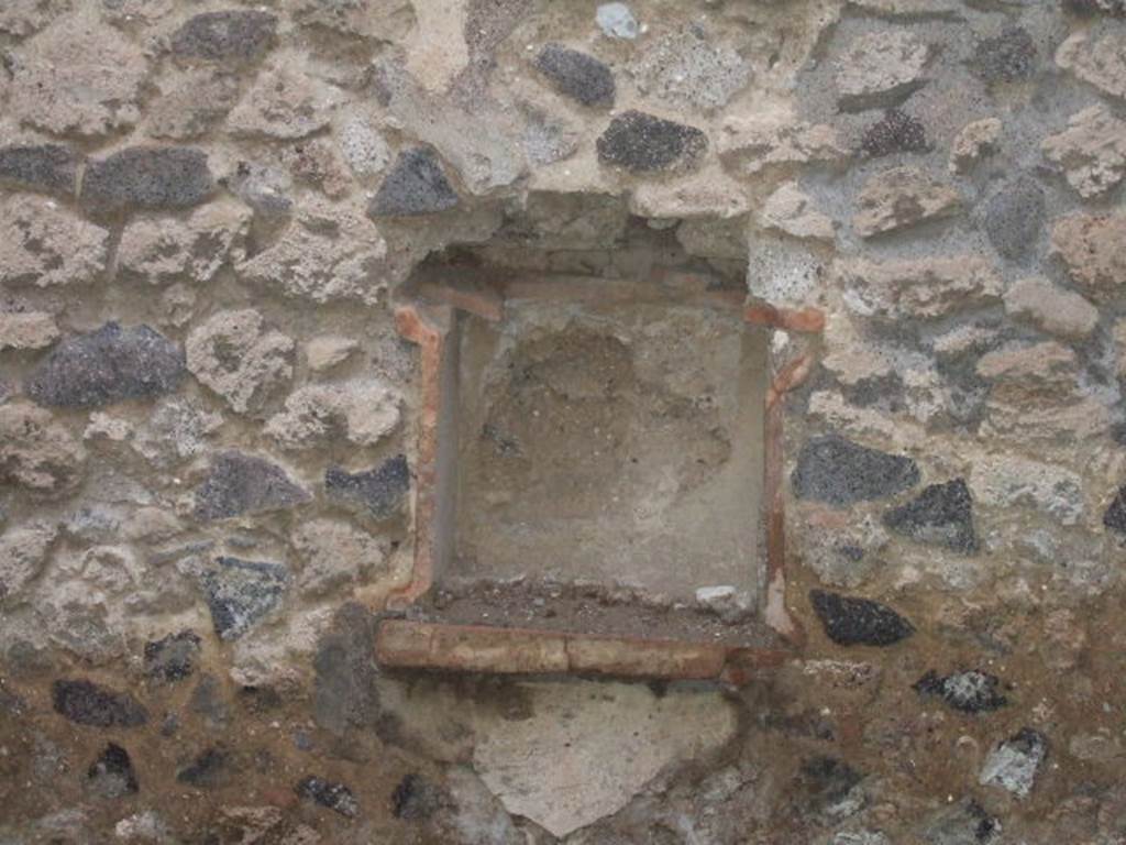 IX.2.5 Pompeii. December 2005. Niche Lararium in north wall of garden.