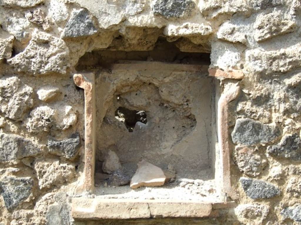 IX.2.5 Pompeii. March 2009. Niche lararium in north wall of garden. According to Boyce, this square niche was called la nicchia de’ Penati, by Fiorelli. See Boyce G. K., 1937. Corpus of the Lararia of Pompeii. Rome: MAAR 14. (p. 80) See Pappalardo, U., 2001. La Descrizione di Pompei per Giuseppe Fiorelli (1875). Napoli: Massa Editore. (p.141)