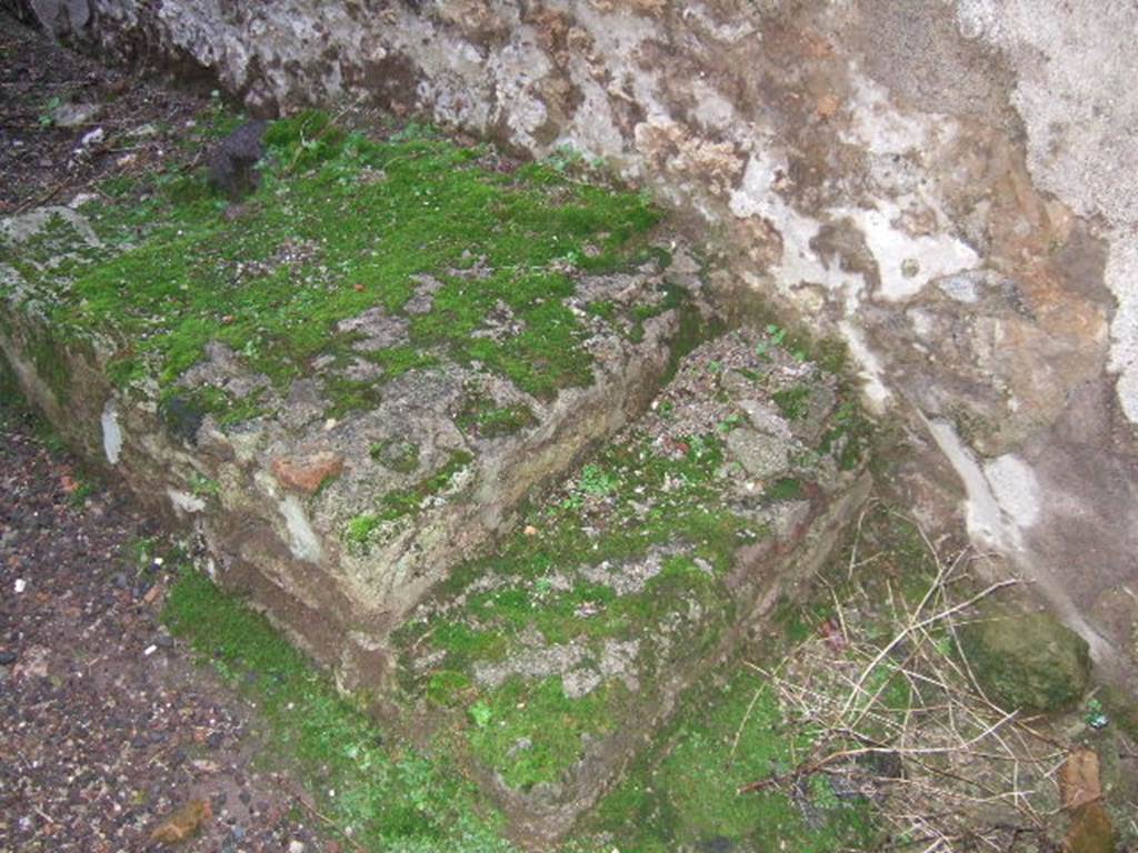 IX.2.5 Pompeii. December 2005. Stairs against south wall of narrow passageway.
The first three steps were masonry, and would have been topped with wooden steps.
The latrine was under the stairs, there was possibly a hearth nearby.
See Pappalardo, U., 2001. La Descrizione di Pompei per Giuseppe Fiorelli (1875). Napoli: Massa Editore. (p.141)