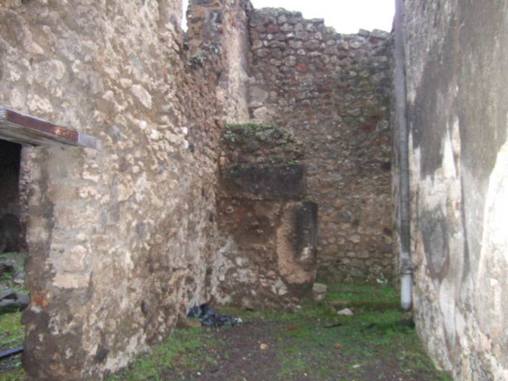 IX.2.8 Pompeii. December 2005. Looking east to small storeroom and kitchen with latrine.
The doorway on the left linked to IX.2.7.
