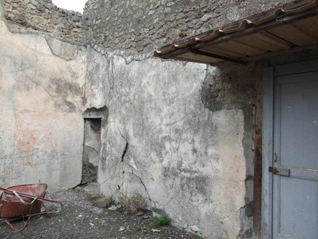 IX.2.16 Pompeii. December 2007. East wall of atrium. On the east side of the atrium was a triclinium. According to Sogliano, paintings found in this room were –
Hercules and Nessus (p.83, no.501)
Bellerophon (p.92, no.522)
Amazons (painting damaged to upper left corner) (p.100, no.547)
See Sogliano, A., 1879. Le pitture murali campane scoverte negli anni 1867-79. Napoli: Giannini.
According to BdI, paintings found in this room were –
North wall – Bellerophon and the amazons
East wall – Bellerophon and Stheneboea
West wall – Hercules and Nessus.
See BdI, 1871, (p.200-204)
According to Jashemski, Schefold reported a fine garden painting on the north wall under the painting of Bellerophon and the amazons, but the plaster had fallen, and no drawing had been preserved.
See Schefold, K., 1957. Die Wände Pompejis. Berlin: De Gruyter. (p.243)
See Jashemski, W. F., 1979. The Gardens of Pompeii. New York: Caratzas. (p.401)
