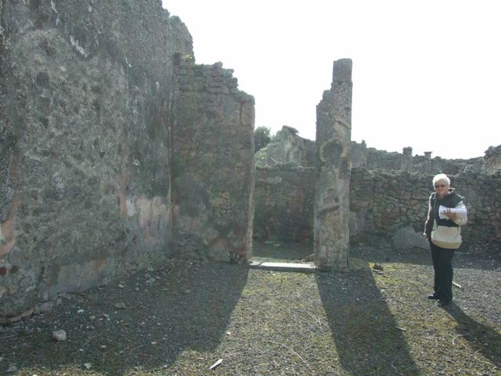 IX.2.17 Pompeii. March 2009. Looking west along south side of Room 1, Atrium, towards Doorway to Room 4, Cubiculum.