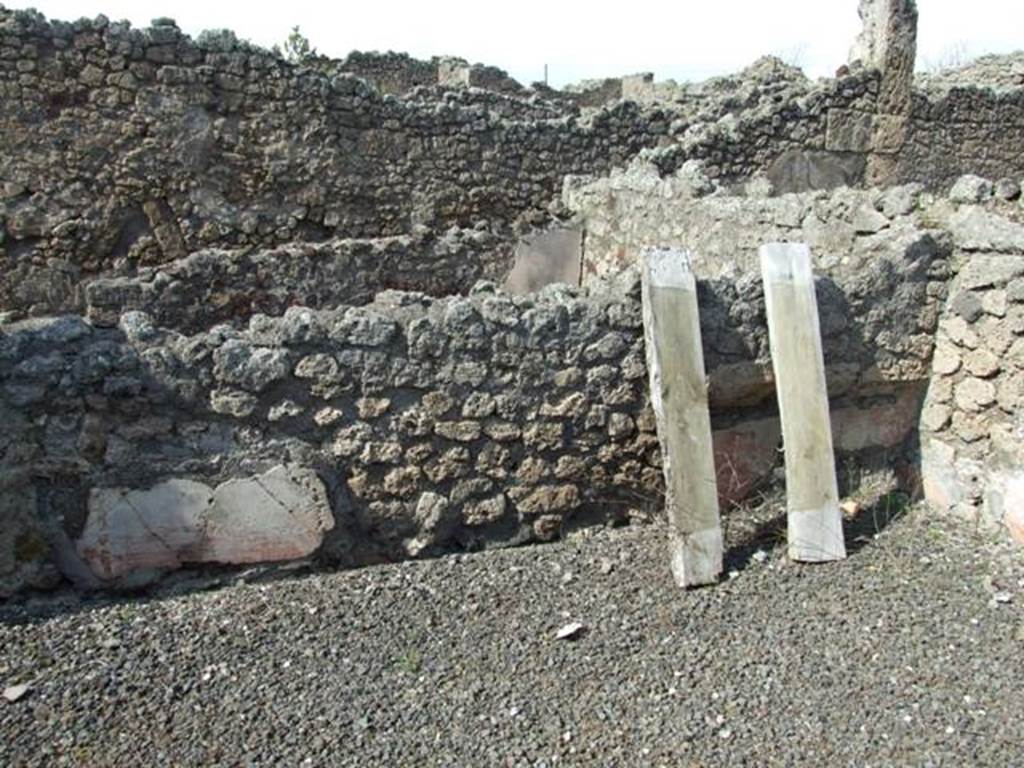 IX.2.17 Pompeii. March 2009. Room 8, Triclinium. North wall, with remains of painted plaster, and recess.