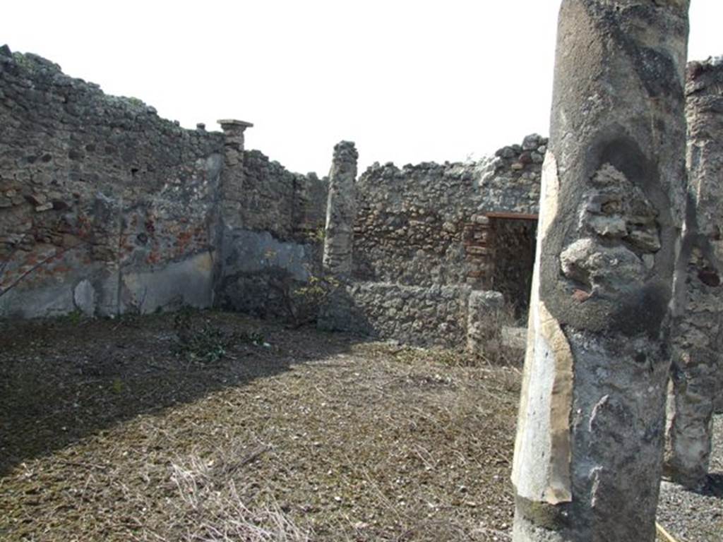 IX.2.17 Pompeii. March 2009. Room 9, garden area. Looking north-west towards north side and columns at the west end. According to Boyce, the two columns at the west end of the north row were connected by a low wall. On the south side of this wall, facing the open area, was painted in red a simple aedicula with pediment. Within the aedicula were painted two yellow serpents confronted at an altar.
See Boyce G. K., 1937. Corpus of the Lararia of Pompeii. Rome: MAAR 14. (p. 81, no. 397)
