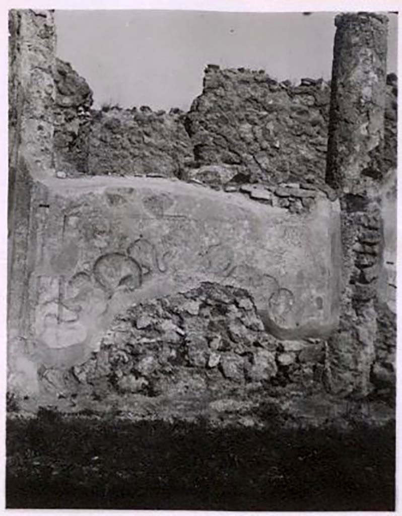 IX.2.17 Pompeii. Pre-1943. Photo by Tatiana Warscher.
Room 9, painted lararium on south side of north wall at west end of garden area.
See Warscher, T. Codex Topographicus Pompeianus, IX.2. (1943), Swedish Institute, Rome. (no.94.), p. 174.