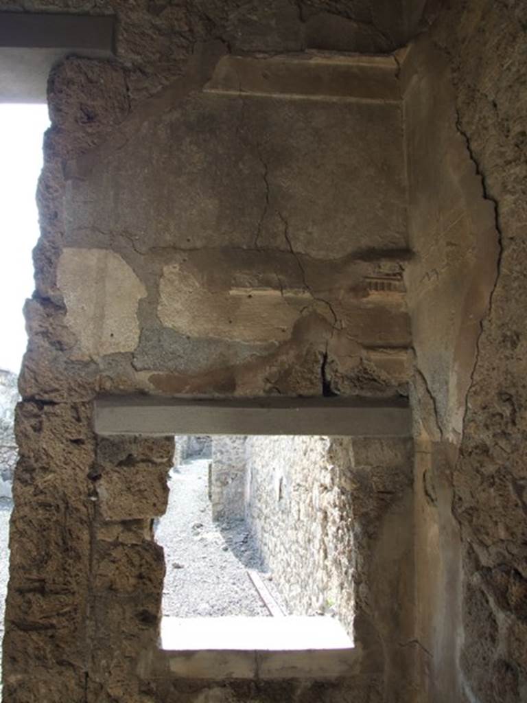 IX.2.17 Pompeii. March 2009. Room 2, Cubiculum. West wall with window to Room 1, Atrium.