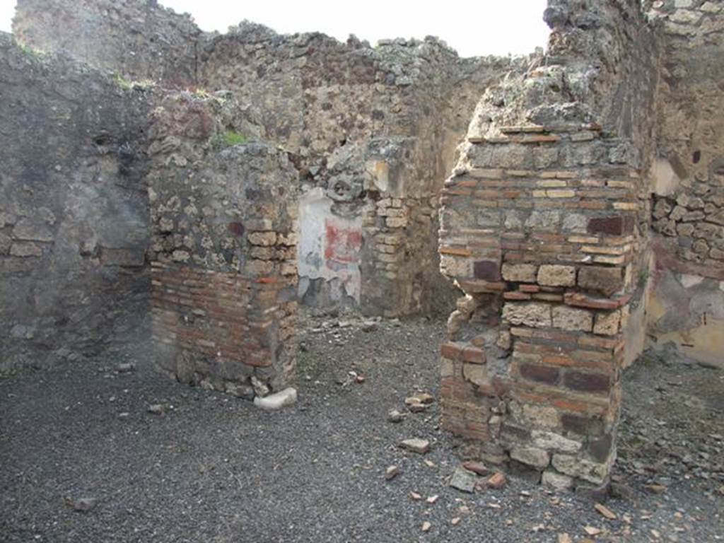 IX.2.21 Pompeii. March 2009. Doorways to rooms 13 and 14, from north portico. According to Boyce, in these two cubicula many objects were found including jewellery and four bronze statuettes:
One was “Abbondanza” holding a cornucopia in the left hand and a patera in the right – probably the Genius -
and Minerva, helmeted and holding a spear in the right hand, and a shield on the left arm.
Also found were the two Lares, each holding rhyton and patera.
See Boyce G. K., 1937. Corpus of the Lararia of Pompeii. Rome: MAAR 14. (p.81)
Boyce’s reference was given as Giorn. Scavi, N.S., ii, 1872, 281.