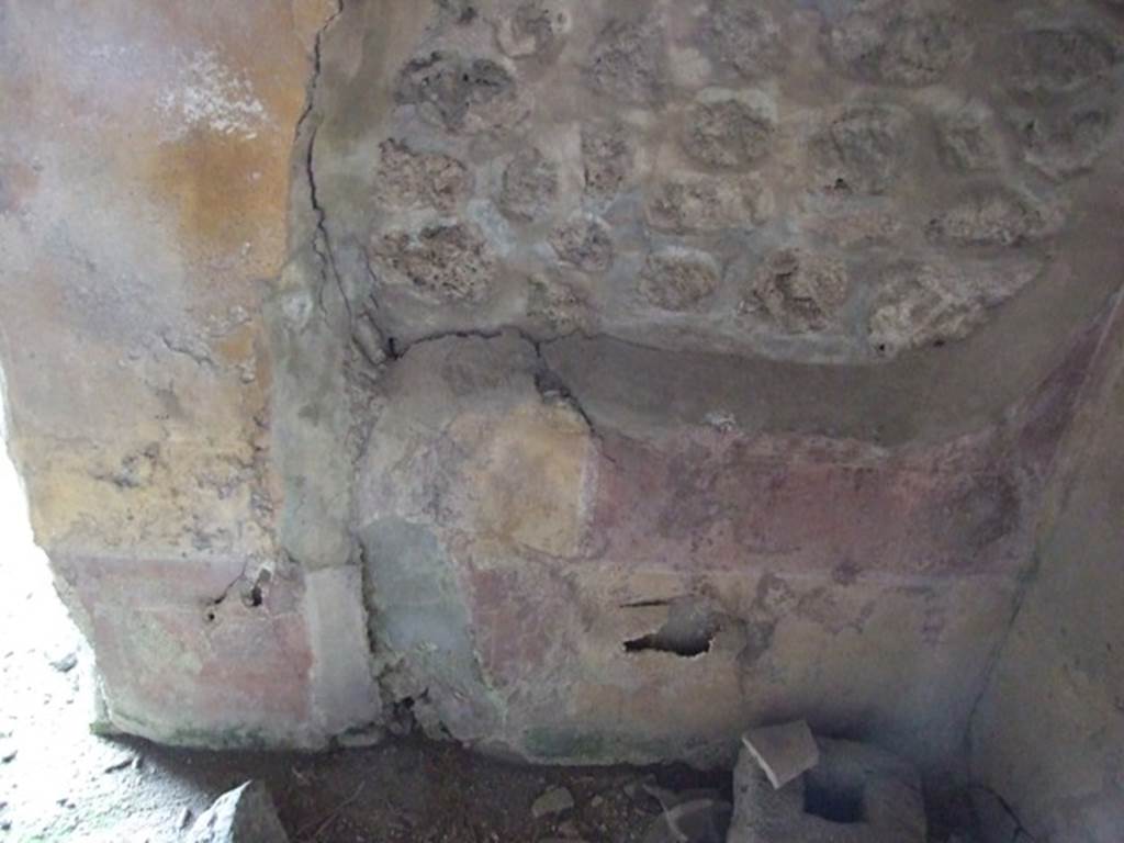IX.2.21 Pompeii. March 2009. Room 2, north-east corner. On the north wall, the dado was discoloured but seemed to be divided into panels. The middle zone was divided into red and yellow panels by borders and two parallel lines, separated by narrow compartments with candelabra.
See Bragantini, de Vos, Badoni, 1986. Pitture e Pavimenti di Pompei, Parte 3. Rome: ICCD. (p.423, ambiente ‘h’).