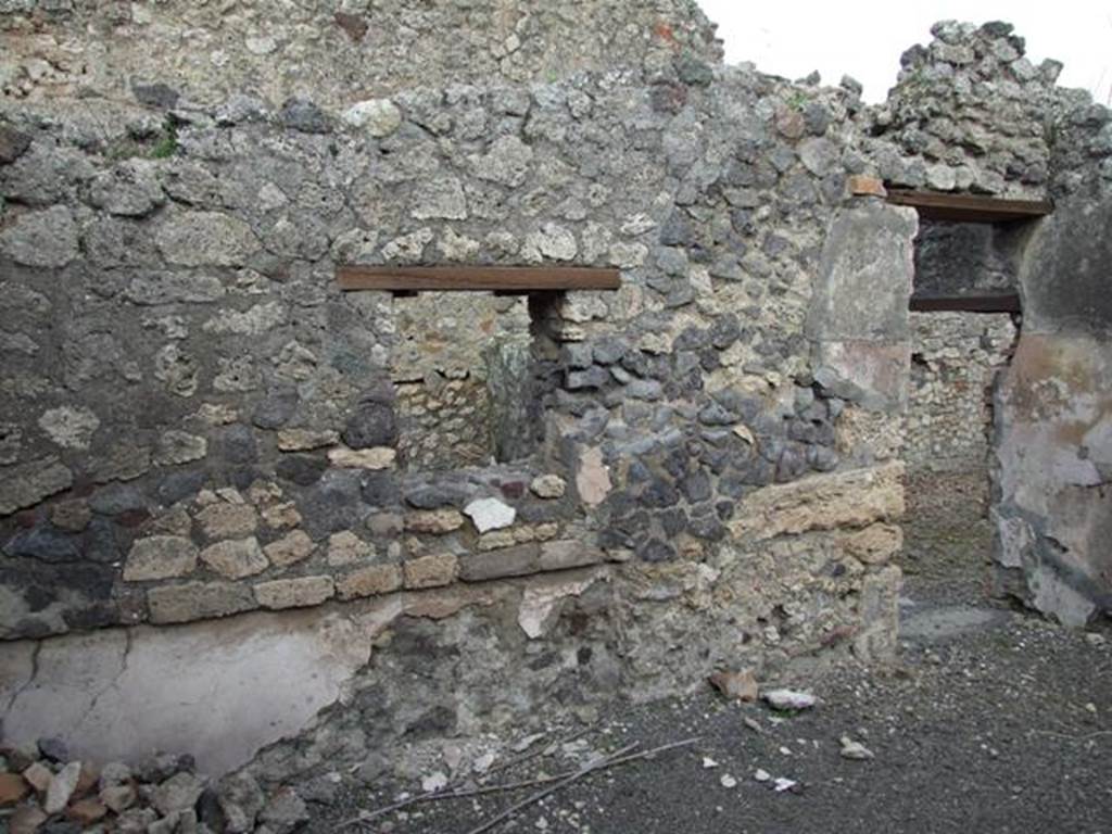 IX.2.24 Pompeii. March 2009. East wall in room on west side of corridor.