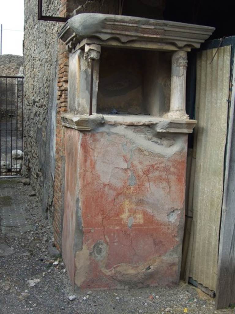 IX.2.26 Pompeii. March 2009. Remains of Lararium.