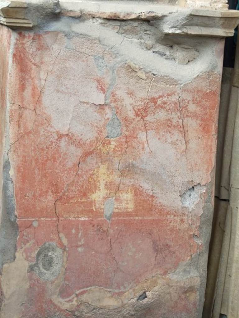 IX.2.26 Pompeii. March 2009. Front of Lararium. A painted alter is just about visible in the centre but the 2 snakes creeping towards it are faded.
