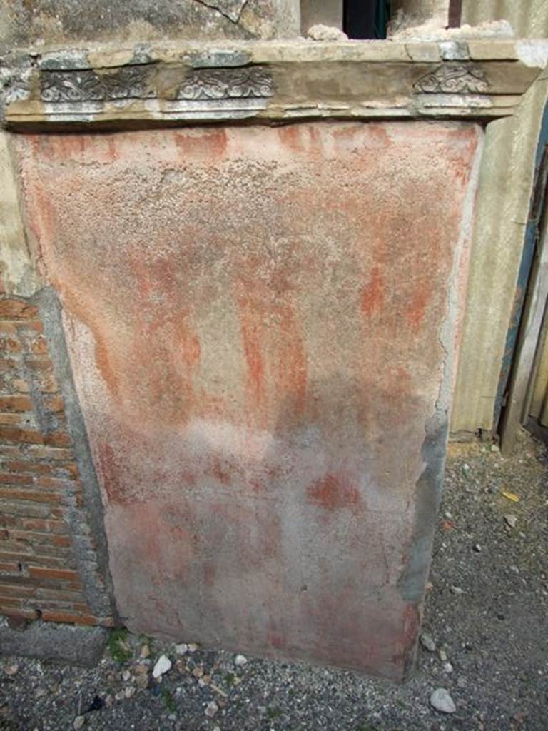 IX.2.26 Pompeii. March 2009. West side of base of Lararium.