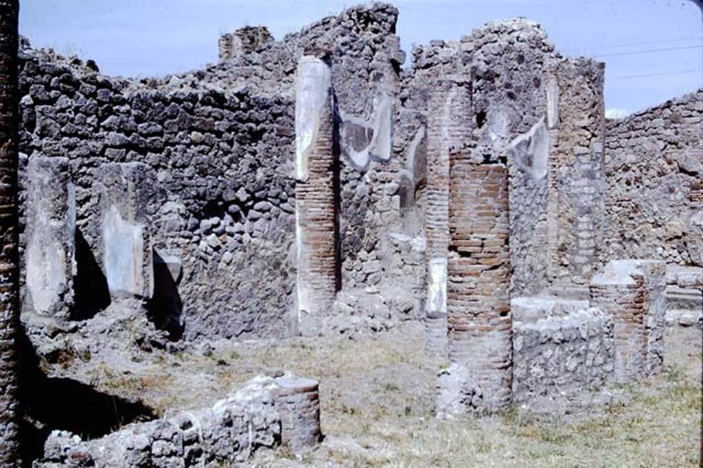 IX.2.27 Pompeii. 1966. Looking towards west wall of the peristyle, with remains of shrine, on left. Photo by Stanley A. Jashemski.
Source: The Wilhelmina and Stanley A. Jashemski archive in the University of Maryland Library, Special Collections (See collection page) and made available under the Creative Commons Attribution-Non Commercial License v.4. See Licence and use details.
J66f0469