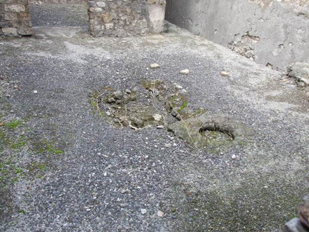 IX.3.13 Pompeii.  March 2009.  Atrium, with remains of impluvium, and cistern.
