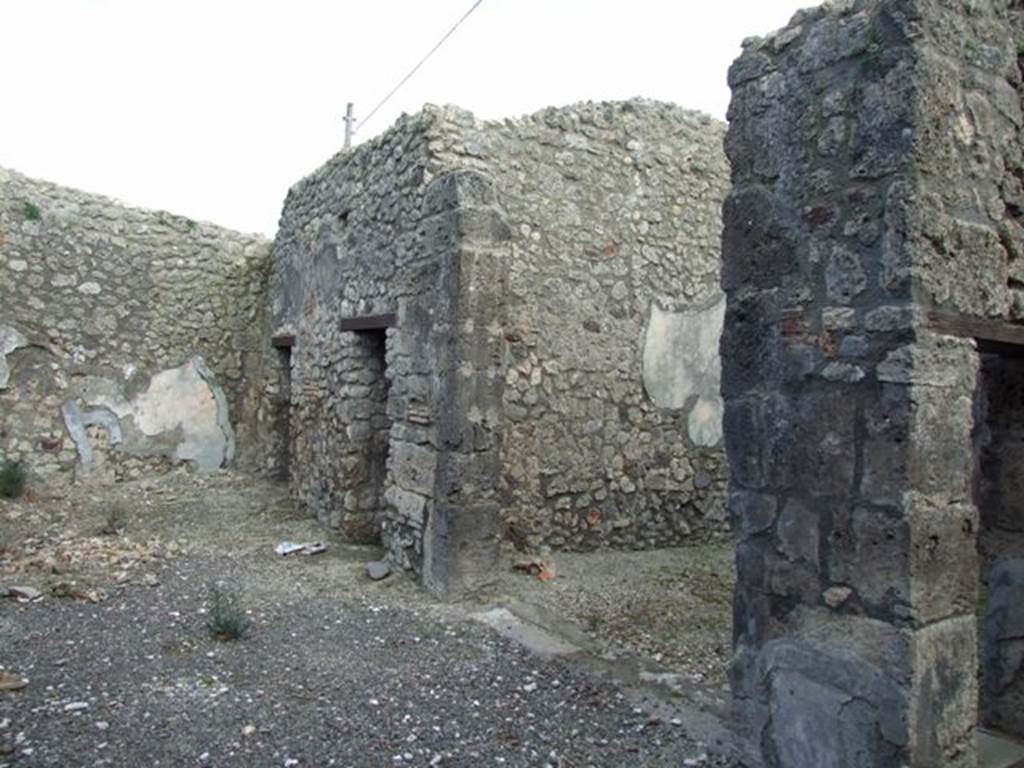 IX.3.15 Pompeii. March 2009. Room 11. Looking east along south portico, with doors to rooms 8,9 and 10.