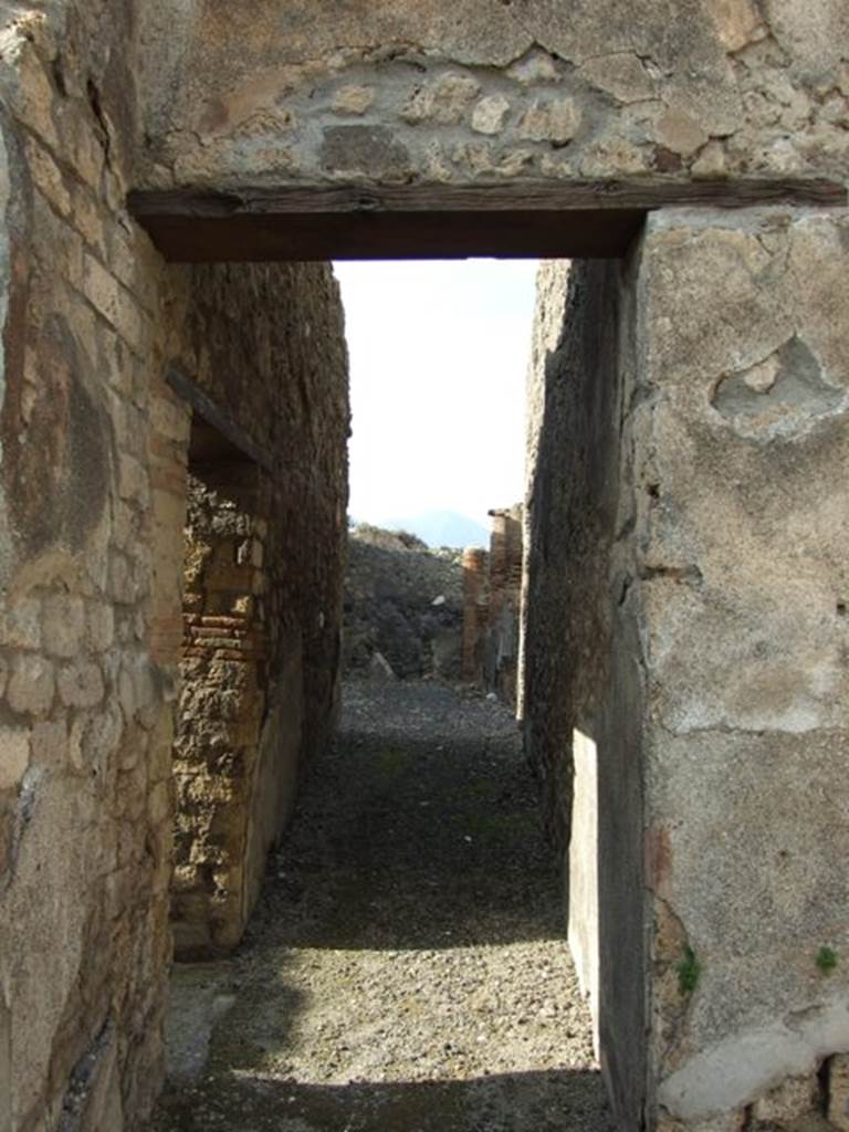 IX.3.15 Pompeii. March 2009. Room 7, corridor, looking north to west portico.