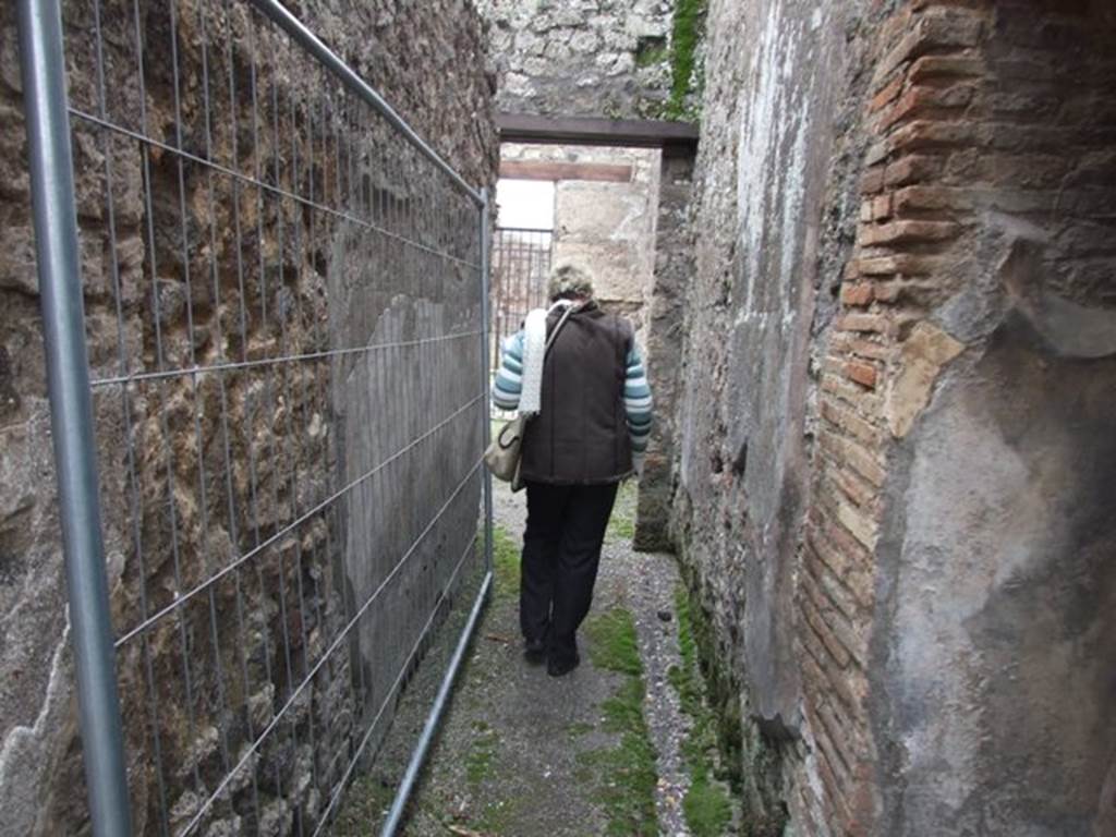 IX.3.19. Taberna T. Genialis. December 2007. Corridor leading south from bakery at IX.3.20.