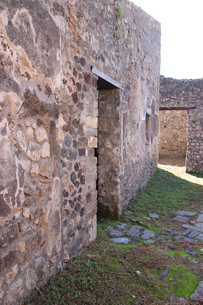 IX.3.20 Pompeii. October 2022.
Looking west towards doorway in south wall, in centre, leading to IX.3.19. Photo courtesy of Klaus Heese.