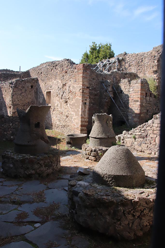 IX.3.20 Pompeii. October 2022.
Looking north-west across bakery room 1. Photo courtesy of Klaus Heese.