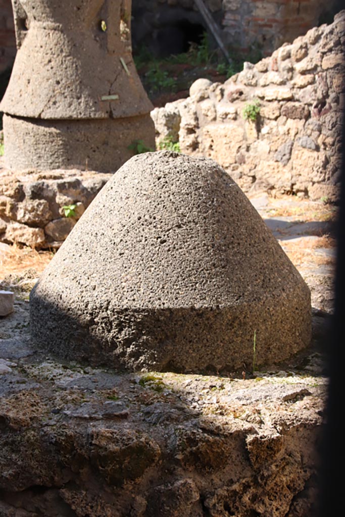 IX.3.20 Pompeii. Pompeii. October 2022. Detail of part of mill from bakery room. Photo courtesy of Klaus Heese.