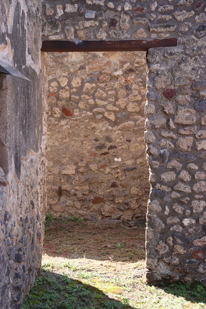 IX.3.20 Pompeii. October 2022.
Doorway to room 9, in south-west corner of bakery room 1. Photo courtesy of Klaus Heese.