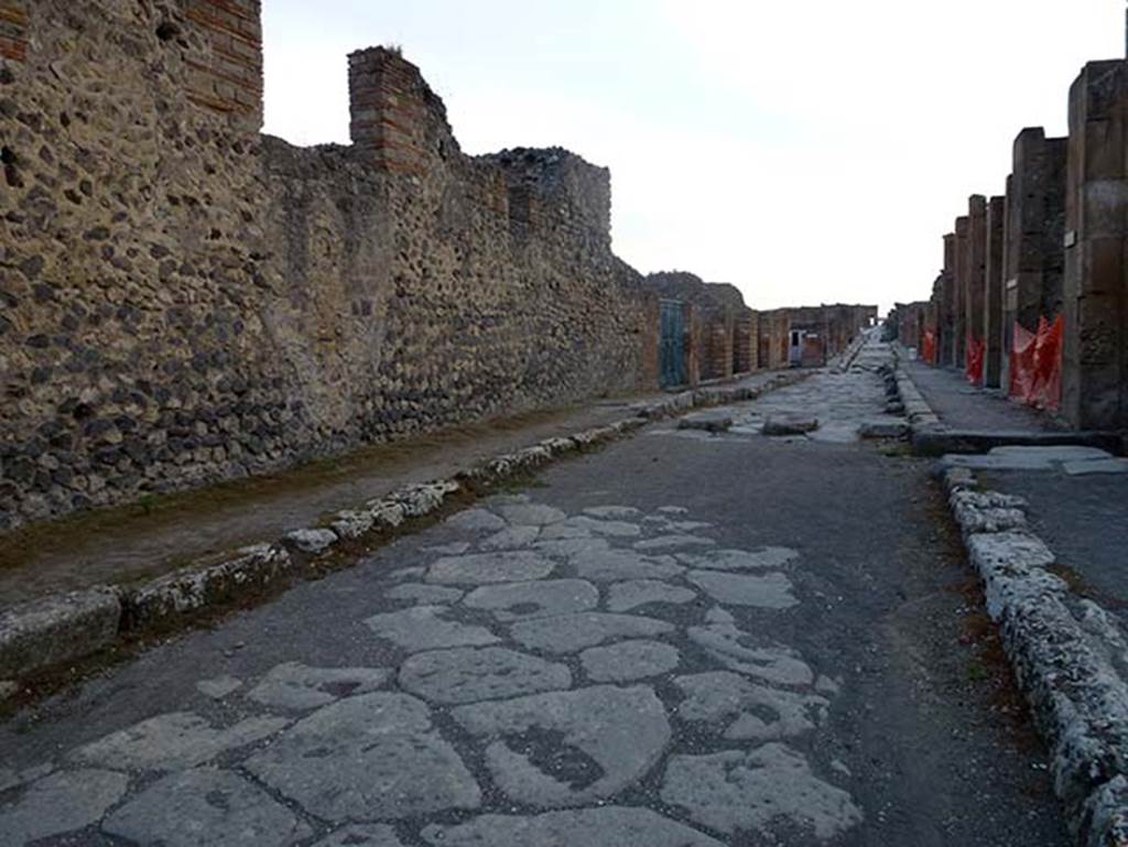 IX.4.18 Pompeii. September 2011. Looking west on Via di Nola.
Terme Centrali or Central Baths. Front of north wall and main entrance “a” (in centre) on Via di Nola. Photo courtesy of Michael Binns.