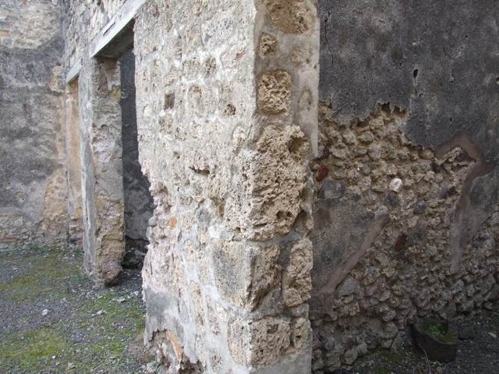 IX.5.2 Pompeii. December 2007.
Looking south to doorways to rooms ‘q’ and ‘r’ on west side of peristyle, and corridor leading to IX.5.22 the rear entrance.
According to Boyce, in the west wall of a room on the upper floor, above the first room on the west side of the peristyle, was a rectangular niche.
See Boyce G. K., 1937. Corpus of the Lararia of Pompeii. Rome: MAAR 14. (p. 85, no. 420)